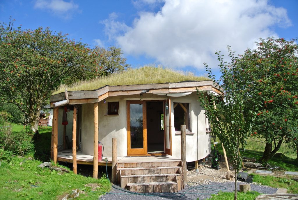 The straw bale roundhouse just before her paint job